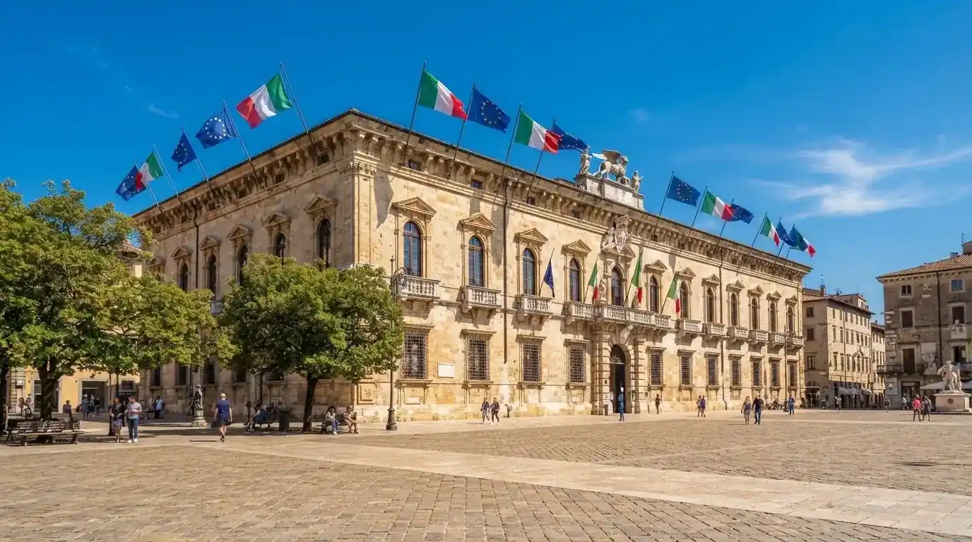 Palazzo istituzionale con bandiere al vento in una piazza soleggiata — casino online con soldi finti